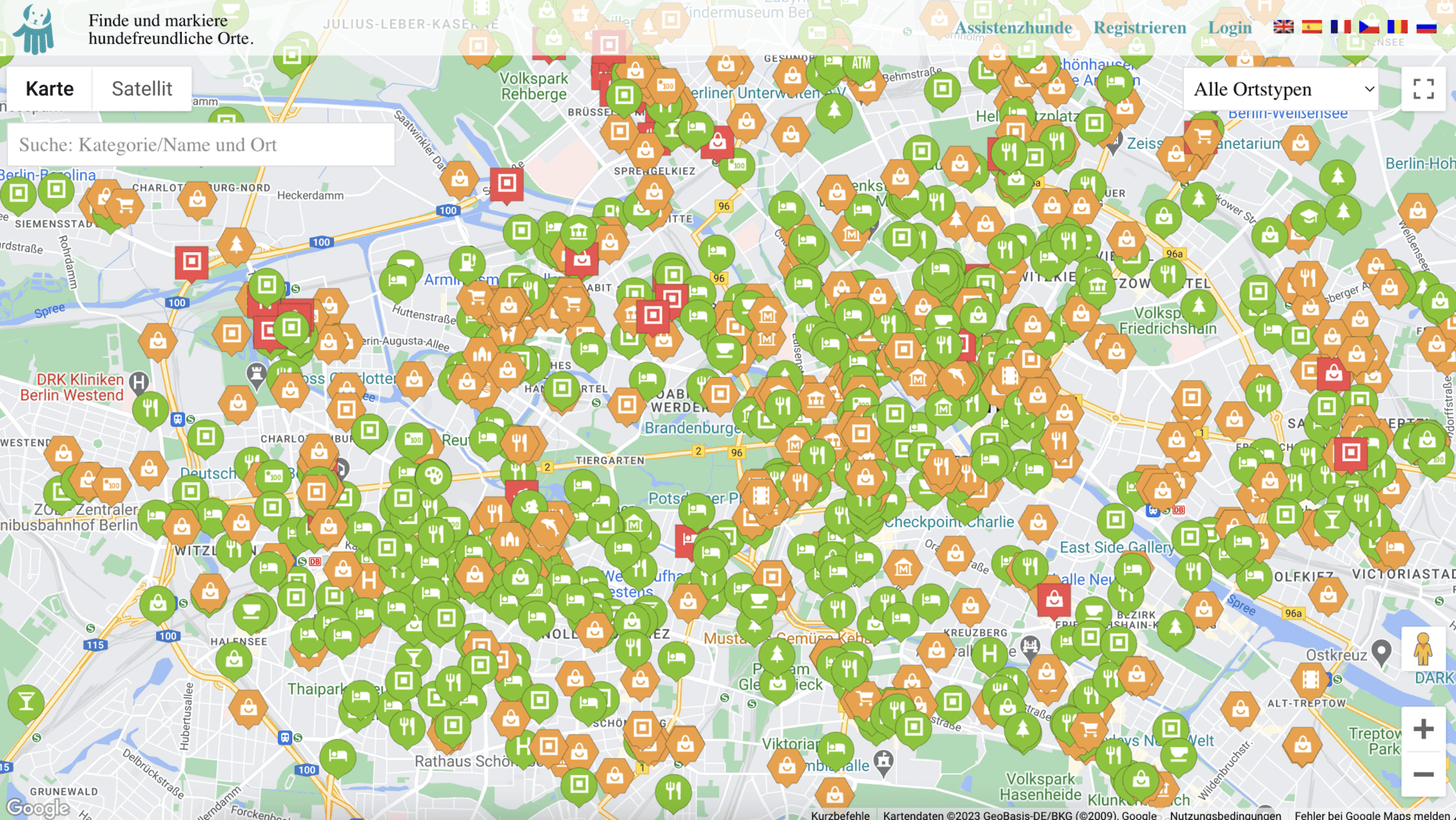 Eine Karte mit orangefarbenen und grünen Markierungspunkten.